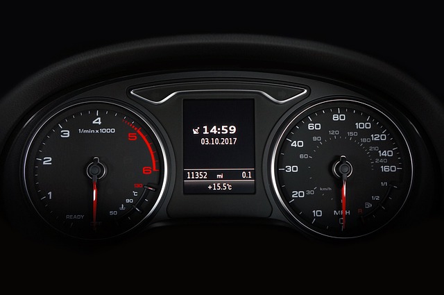 Interior shot of a modern car dashboard, featuring digital displays and ergonomic design.
